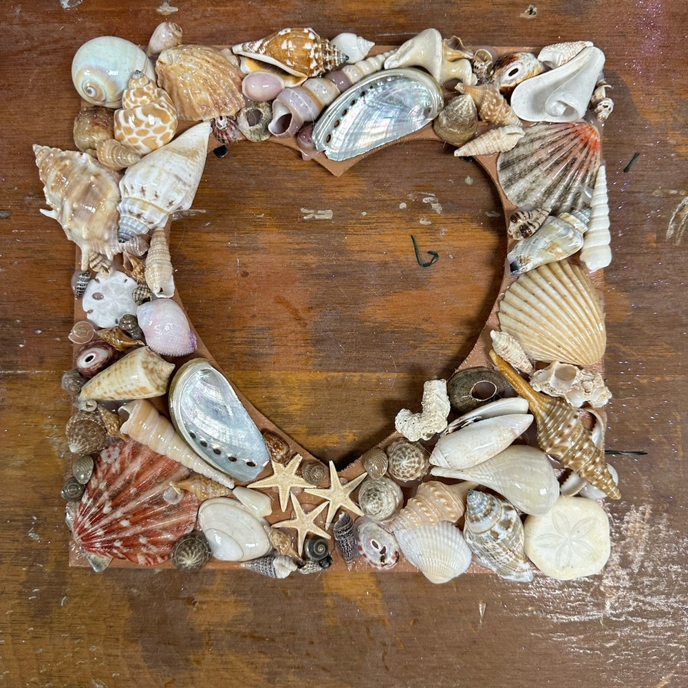 Wooden heart picture frame with shells